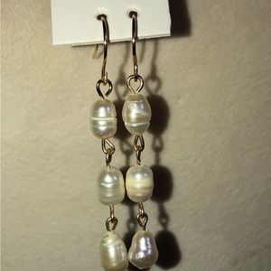 Classy pearl earrings.